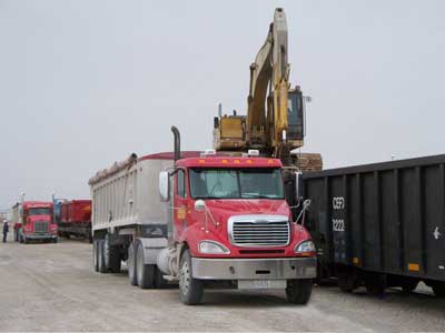  Clean Harbors increases efficiency and reduces transportation costs by engineering unique ways to offload dump trailers into rail-cars.  